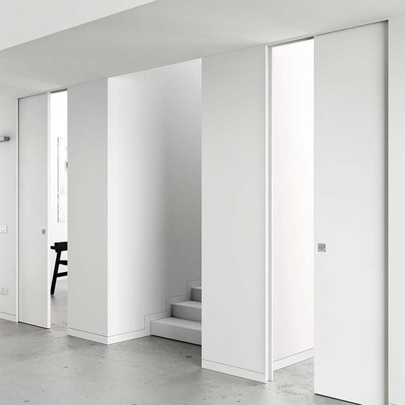 Пенал без обрамления для одностворчатой раздвижной двери Eclisse Syntensis в интерьере